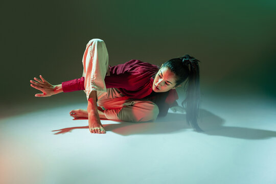 Latin woman dancer perform contemporary floor movement