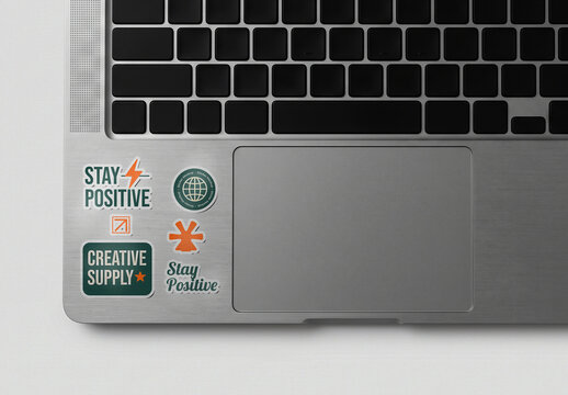 Stickers on a Laptop Keyboard Mockup