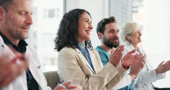 Applause, meeting and director with doctors in hospital for presentation, announcement or training. Discussion, people and team of healthcare employees with clapping for medical service in clinic.