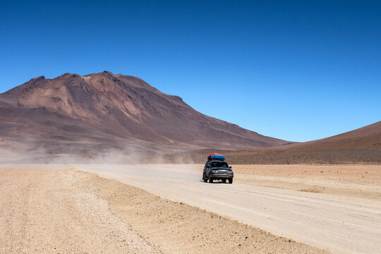 Off-road vehicle crossing high altitude desert in Bolivia