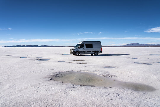 Camper van on Salar de Uyuni salt flat in Bolivia