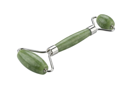 Green jade facial roller for skincare massage on black background