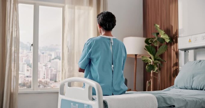 Back, thinking and woman on bed at hospital, vision and anticipation for surgery recovery. Thoughts, female person and patient in icu ward with reflection, inpatient and healthcare for rehabilitation