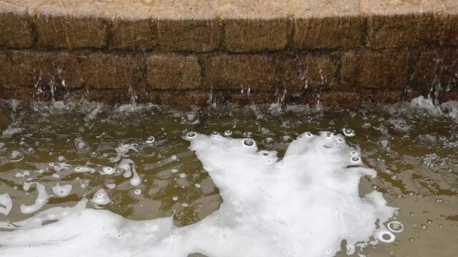 Water flowing in a slow motion fountain cascade