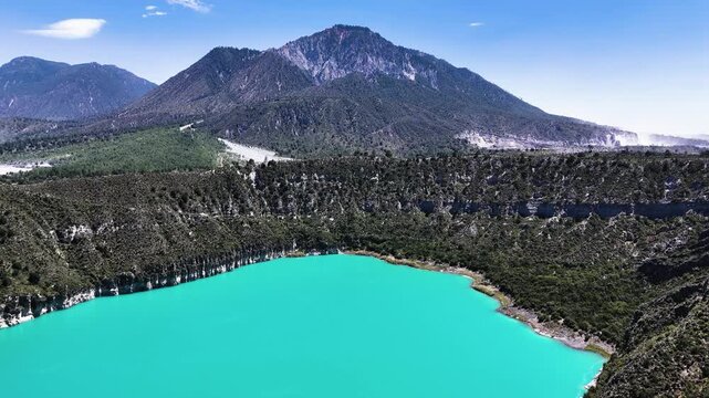 Frontal video of a lagoon (maar) and a mountain in Puebla, Mexico