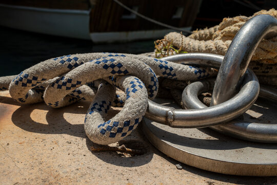 Close-up of an old rope at a fishing harbor