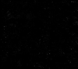 Fototapeta premium Vintage film grain texture with heavy dust particles and scratches on black background for overlay effects old cinematic aesthetic retro photo look monochrome grunge surface design.