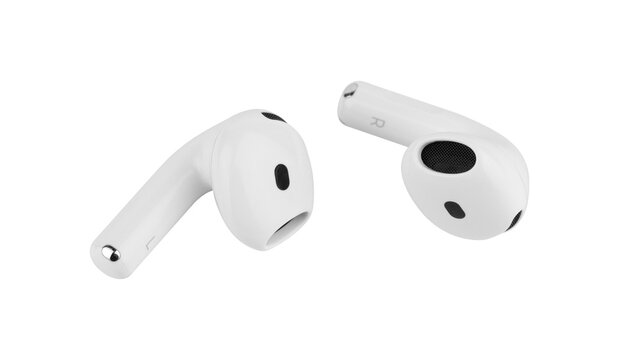 Pair of white Apple AirPods 4 wireless earbuds close up, fourth generation bluetooth headphones isolated from background