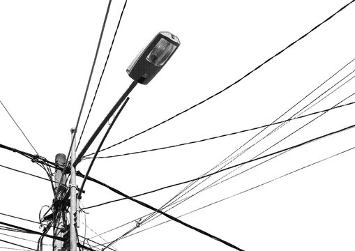 Large halftone overhead street light and electric cables with a transparent background