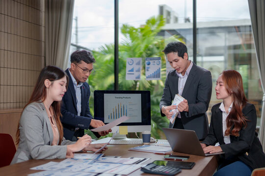 Business team analyzing data during strategy meeting