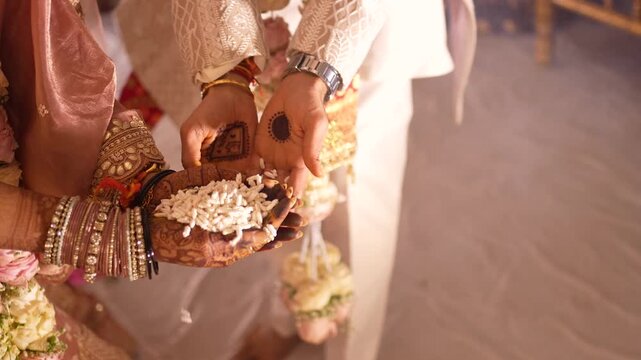 Traditional Indian Wedding Ritual with Rice Offering