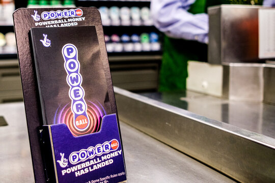 A Close-Up View Of A Powerball Lottery Game Promotional Leaflet Inside A UK Supermarket