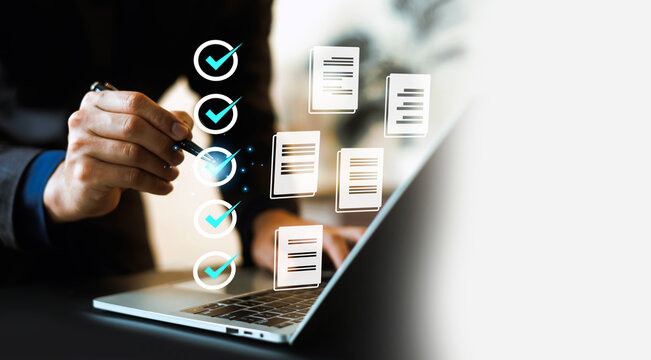 Business professional reviewing electronic documents with a digital checklist, document verification, workflow automation, compliance management, paperless office, and secure data processing.