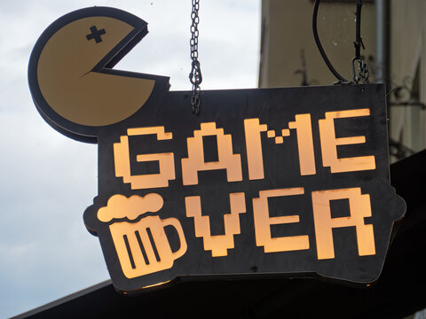 Game Over Neon Sign Featuring Pixel Art