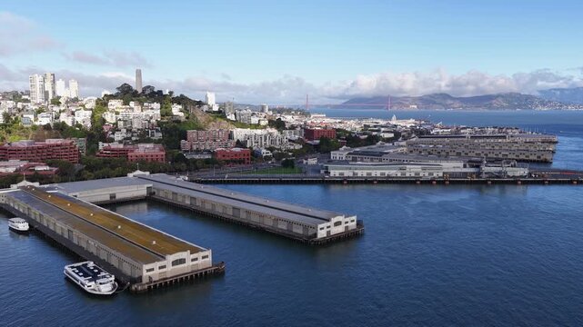 A Clear Morning View of the Northern San Francisco Waterfront, Featuring Coit Tower, the Golden Gate Bridge, and Waterfront Piers in San Francisco, California, USA - Aerial Drone Shot
