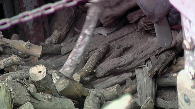 Railway Workers Loading Firewood Logs into Train Wagon in Argentina - 4K
