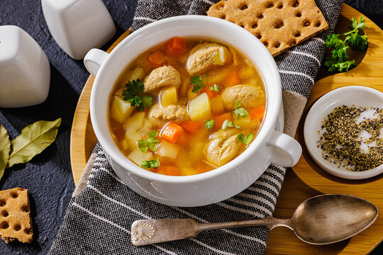 Hot Estonian Frikadellisupp in a white bowl