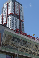 Fototapeta premium exterior building facade and sign of Scotiabank Theatre, a movie house, located at 259 Richmond St W, Toronto (behind: Picasso Condominiums)