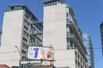 Fototapeta premium rooftop billboard for McDonald's Canada (summer beverages) and view of District Lofts (388 Richmond St W at Spadina Av) Toronto
