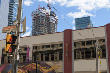 Fototapeta premium exterior of The Ballroom Bowl, a bowling alley, located at 145 John St (seen here from Richmond St W) and FORMA Toronto Condos