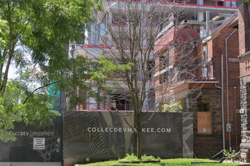 Fototapeta premium hoarding at Cielo Condos (300 Bloor St W, Toronto), a new residential tower rising above and incorporating the restored heritage fabric of Bloor Street United Church
