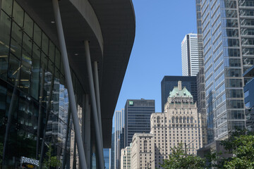 Fototapeta premium (left) ICE Condominiums (14 York St) and (right) Fairmont Royal York hotel and Financial District office towers, Toronto