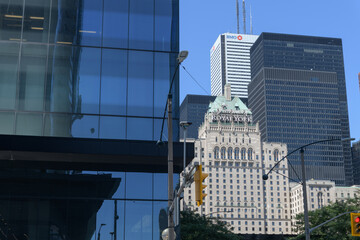 Fototapeta premium looking north on York St from Bremner Blvd to Fairmont Royal York hotel and office towers in Toronto's financial district