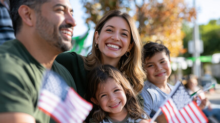 Fototapeta premium Happy diverse Hispanic American family celebrating together during a festive outdoor Colombus Day parade with small national flags in the sun