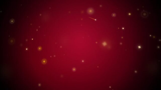 Glowing golden sparkles and stars gently floating across a rich red gradient background in a wide festive motion graphic shot, creating a magical holiday atmosphere for Christmas or awards.