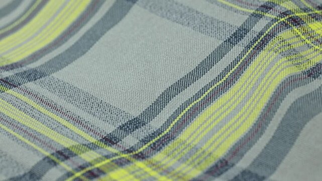 Close look at fabric with lines and patterns in a textile shop