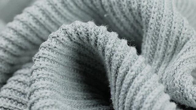 Soft gray knit fabric shown in close-up from different angles