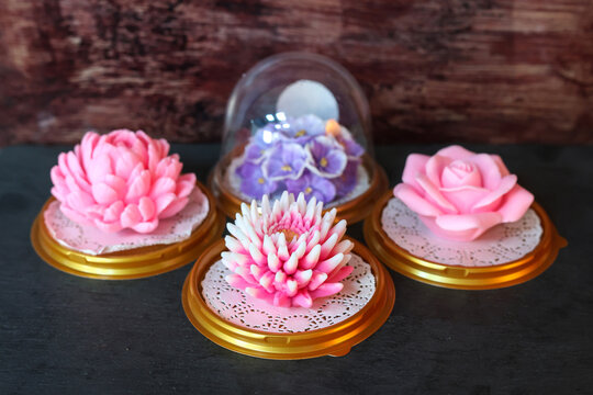 Elegant handmade soap flowers arranged in a beautiful gift box, delicate floral packaging perfect for romantic presents and spa decoration.