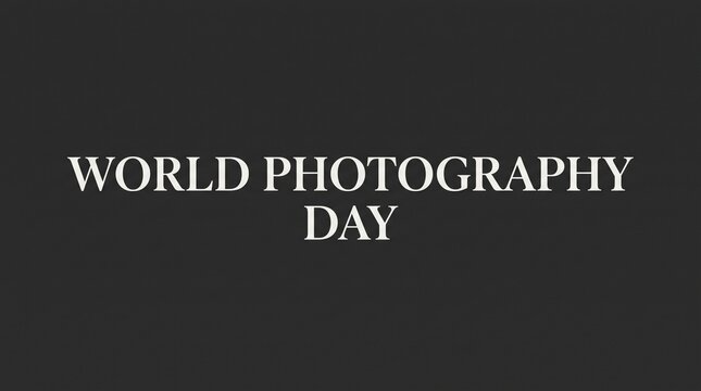 World Photography Day text on dark background, elegant white serif typography for international photo holiday, minimalist black and white graphic