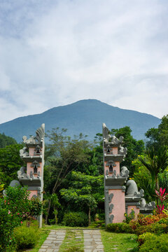 Mount Ciremai behind traditional split gate