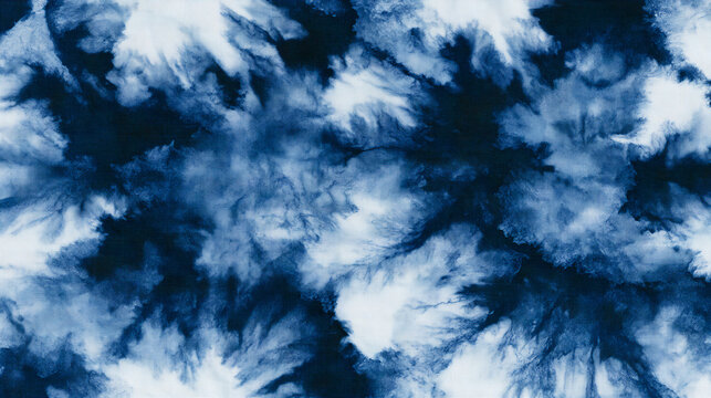 Abstract blue and white tie dye print fabric background pattern