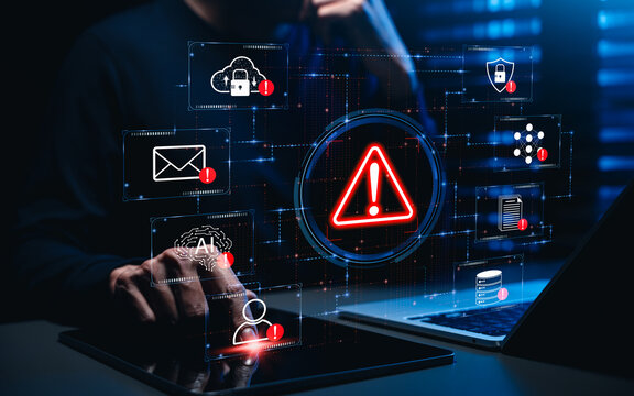 Cybersecurity threat alert concept. Person using laptop and tablet, virtual warning dashboard, cloud security risk, email threat detection, AI monitoring, database protection and network vulnerability