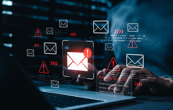 Phishing detection cybersecurity alert warns person about suspicious emails, unverified senders, and malicious links on laptop, fraud prevention, email security, threat monitoring and data protection