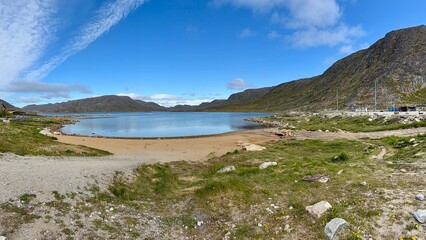 The fjords, mountains, and icebergs near Qaqortoq, Greenland © Joni