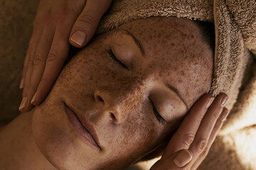 Naklejka premium facial massage in progress.