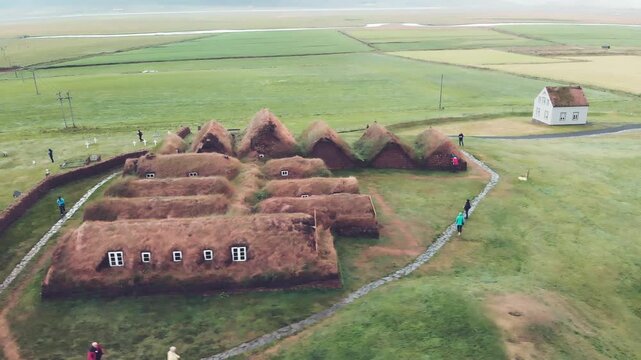 Historic Glaumbaer Village with red church seen from above.