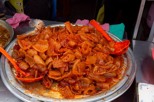 A large metal tray filled with Korean street food, in Busan, South Korea