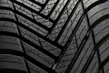 New car tires with a new design is presented at an auto parts fair, expose for selling . Photographed in natural light  © Silviu