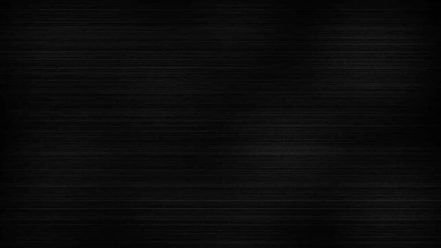 Dark black brushed metal texture with horizontal lines and subtle light reflections across the surface creating a sleek industrial appearance