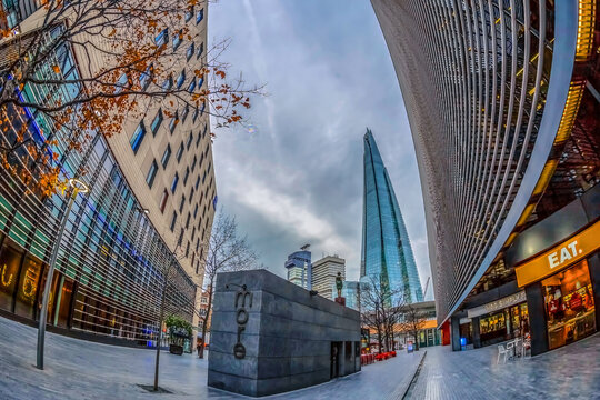 LONDON, ENGLAND - NOVEMBER 27, 2017: Modern and spectacular office buildings on More London Riversid, and The Shard building in bachground.