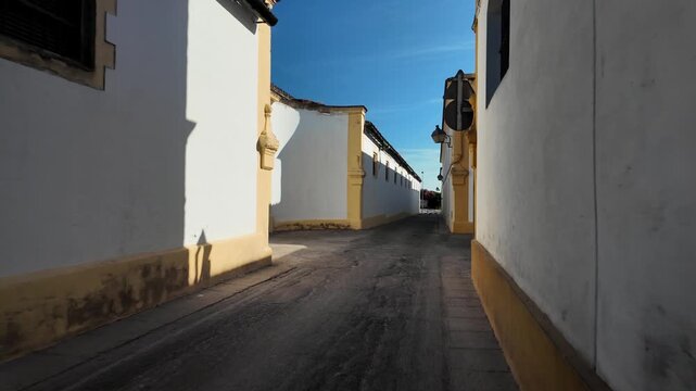 POV walk between historic sherry bodega warehouse buildings, Jerez de la Frontera, Spain
