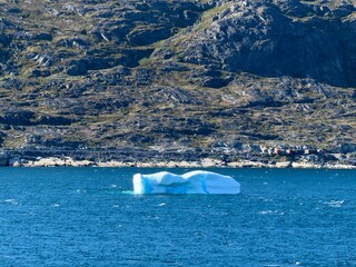 The fjords, mountains, and icebergs near Qaqortoq, Greenland © Joni