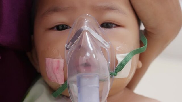 Eight Month Old Infant Receiving Pediatric Respiratory Care with Nebulizer