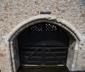 Close up of Traitors gate sign of the St. Thomas Tower, the entrance for prisoners to Tower of London, England, UK © Mike Hayward