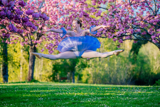 Ballerina performing a split jump