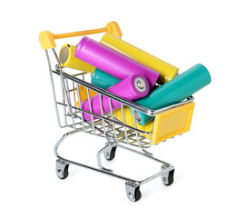 Alkaline batteries in mini shopping cart isolated on white. Waste recycling © New Africa